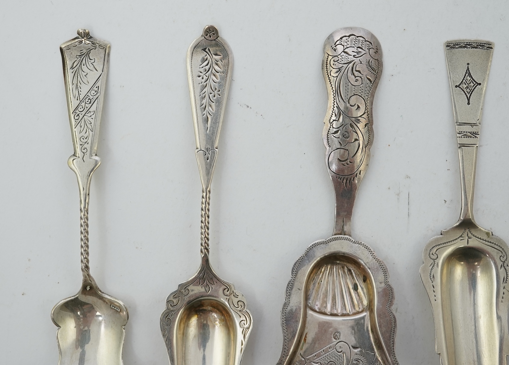 A collection of seventeen mainly 19th century Dutch white metal caddy spoons